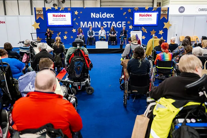 Many of Naidex’s speakers and visitors have specific accessibility needs. Naidex main stage image